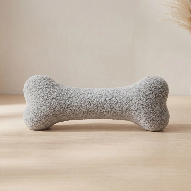 hundespielzeug-knochen-boucle-grau-weich.jpg